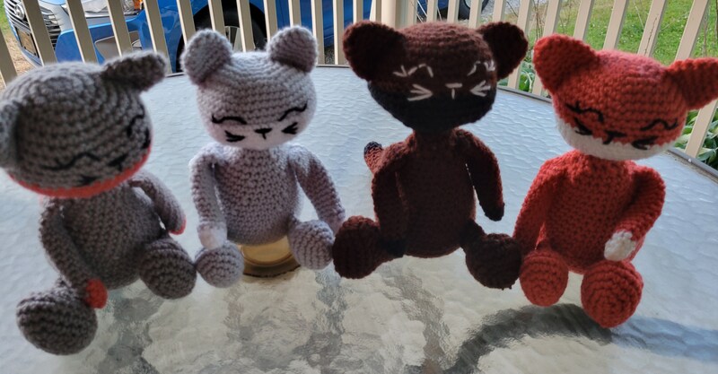 Crocheted plush cats